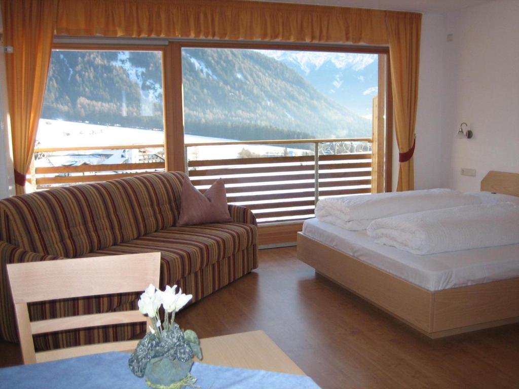 Garni - Appartement Neumairhof 라순디소프라 객실 사진